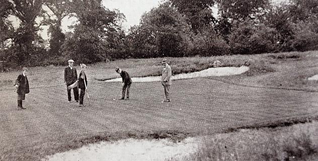 vintage photo of a group of golfers on the green