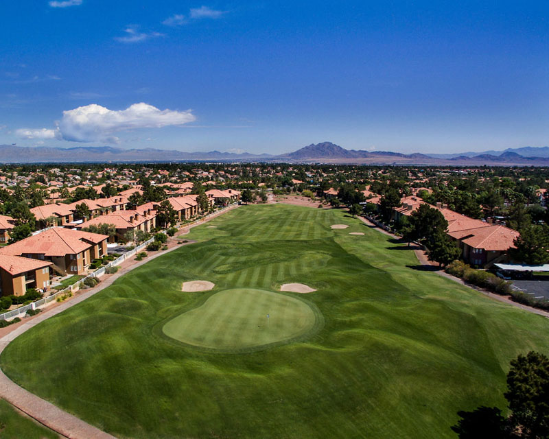 Golf course green with sand traps