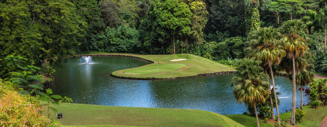 Golf course fountain on pond