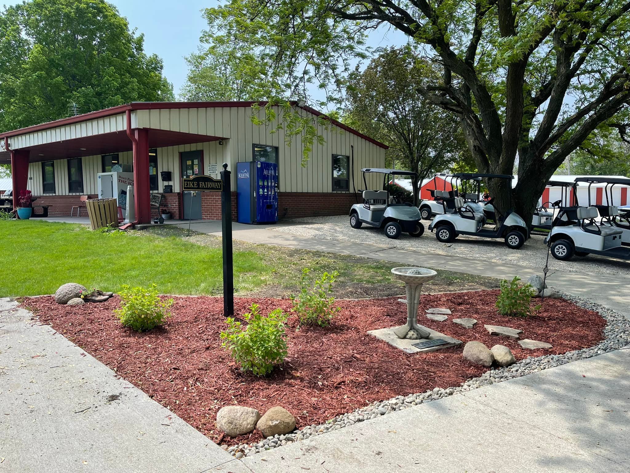 Clubhouse view with golf carts