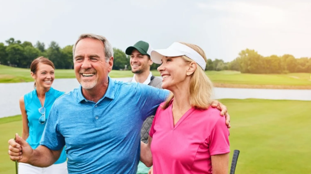 Gathered friends on golf course 