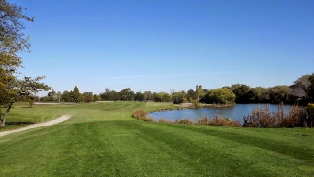 Marquette Park golf course with pond and cart path