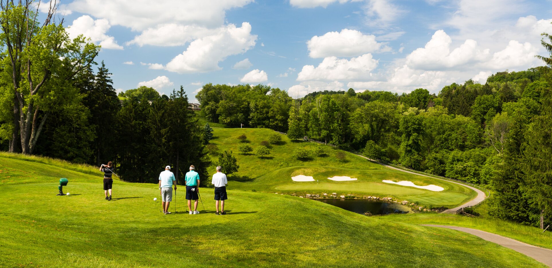 Golfers looking at golf course