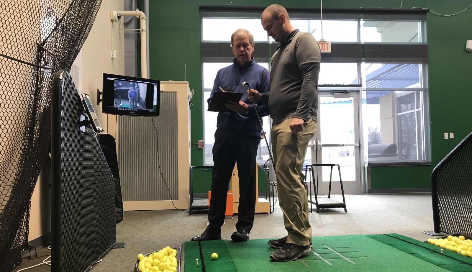 Guests receiving club fitting